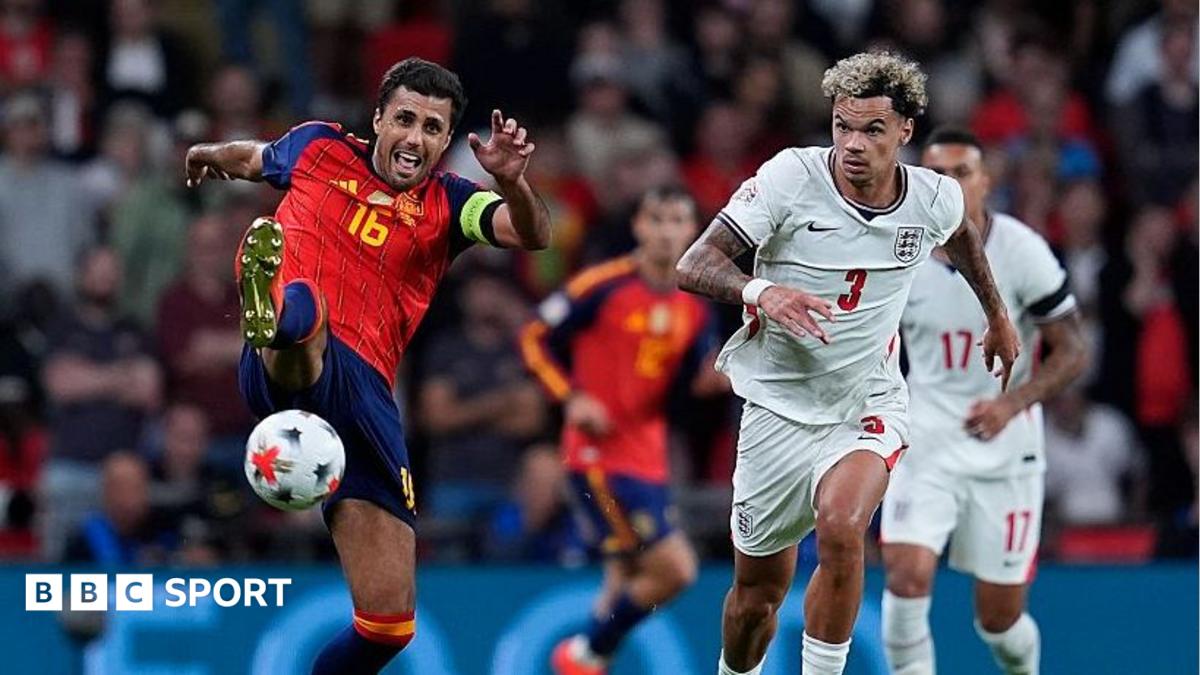Spain midfielder Rodri and England defender Nico O'Reilly battle for possession