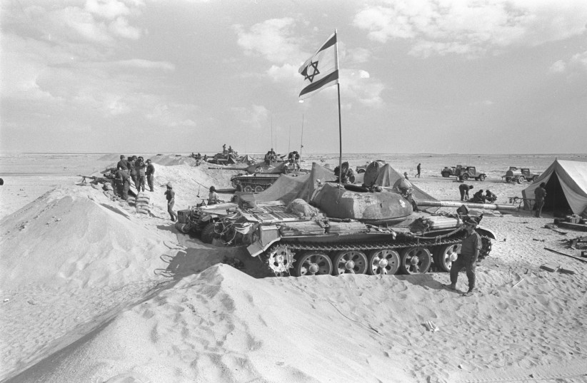 An IDF armored unit in its encampment on the east bank of the Suez Canal during the 1973 Yom Kippur War.