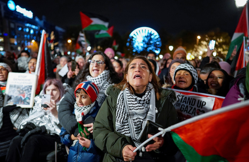 People attend a demonstration in support of Gaza and Palestinians, organised by the Palestine Committee, outside the building of the Norwegian parliament, Stortinget, in Oslo, Norway, November 4, 2023.