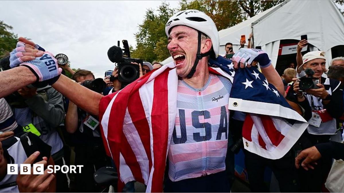 Brandon McNulty celebrating with the American flag after his win.