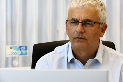 Bank of Israel Deputy Governor Andrew Abir in his office in Jerusalem, July 8, 2020. Credit: Ammar Awad/ REUTERS Bank of Israel Deputy Governor Andrew Abir in his office in Jerusalem, July 8, 2020.