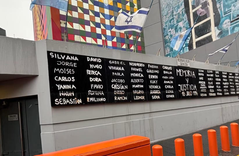 Names of those killed in the 1994 attack on the AMIA Jewish center, which left 85 dead and 300 injured, mark the front of the AMIA Center in Argentina. (credit: JUAN MELAMED)