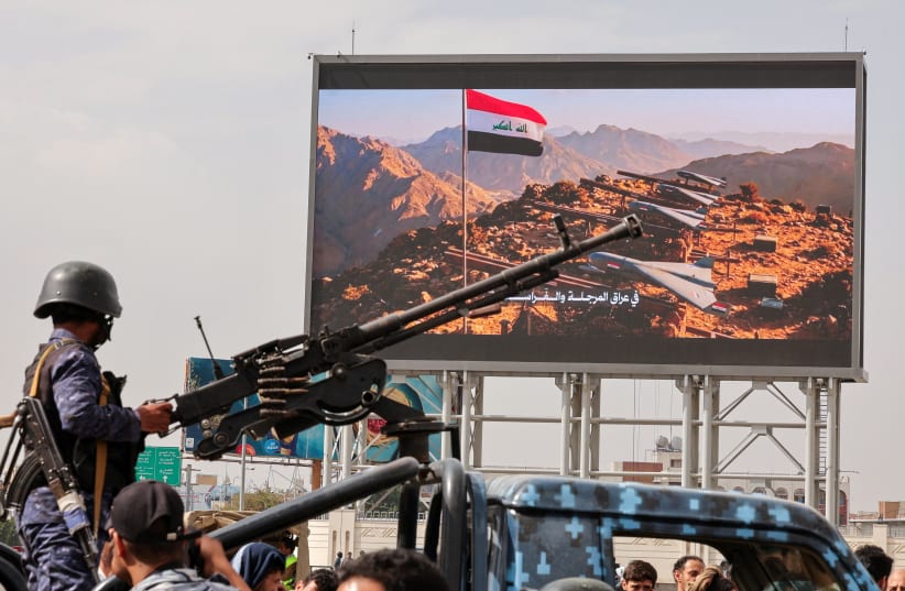 A member of Houthi security forces mans a machine gun mounted on the back of a patrol vehicle at the site of an anti-Saudi rally amid an escalation with the kingdom in Sanaa, Yemen, last month. 