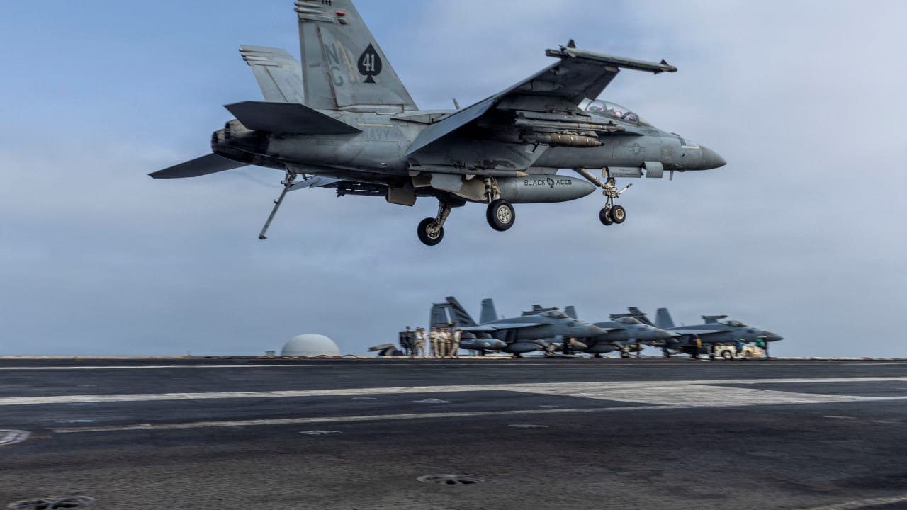 An F/A-18F Super Hornet, assigned to Strike Fighter Squadron 41, prepares to make an arrested landing on the flight deck of Nimitz-class aircraft carrier USS Abraham Lincoln during the ongoing conflict with Iran August 4, 2026. 