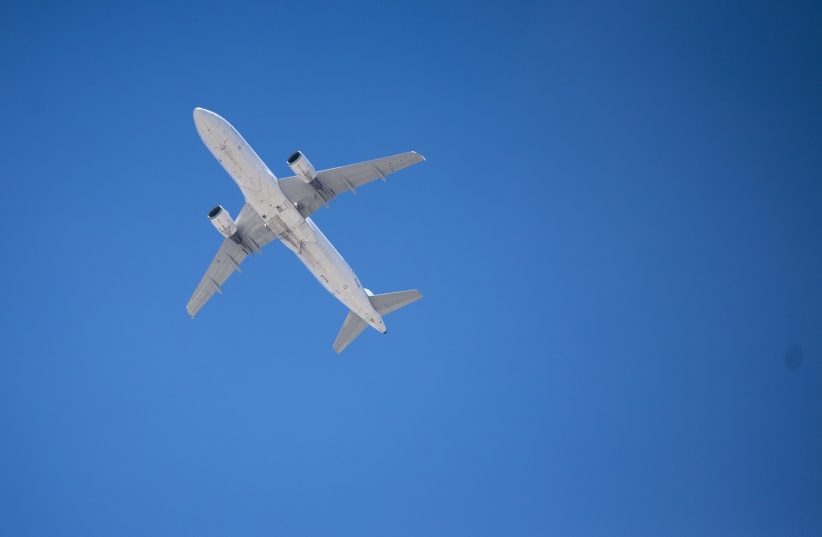 The plane carrying the Iran's National football team flies over Los Angeles International Airport before landing on June 14, 2026, on the eve of the 2026 World Cup football match between Iran and New Zealand.