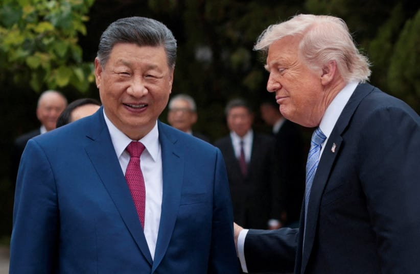 US President Donald Trump speaks with Chinese President Xi Jinping while leaving after a visit to the Zhongnanhai Garden in Beijing, China, May 15, 2026.