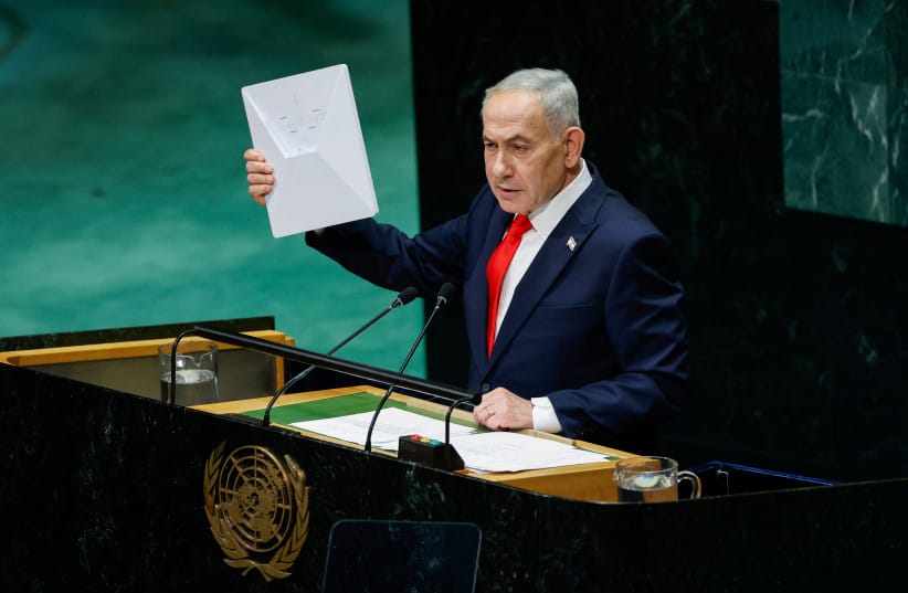 Prime Minister Benjamin Netanyahu holds a Starlink device as he addresses the 81st United Nations General Assembly (UNGA) at UN headquarters in New York City, US, September 24, 2026