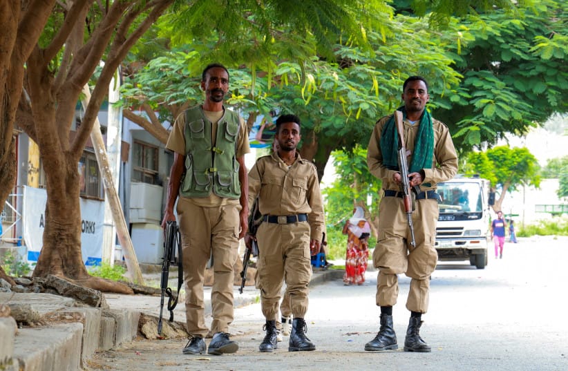 Members of the Tigrayan forces patrol along a street as tensions intensify after the forces launched a major offensive against the federal government in multiple locations, in Mekelle, Tigray Region, Ethiopia, September 24, 2026.