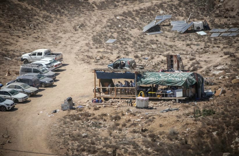 Jewish settlers pray during Yom Kippur at a settlement outpost northwest of the West Bank city of Nablus, September 21, 2026.