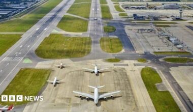Two planes landed at an airport.