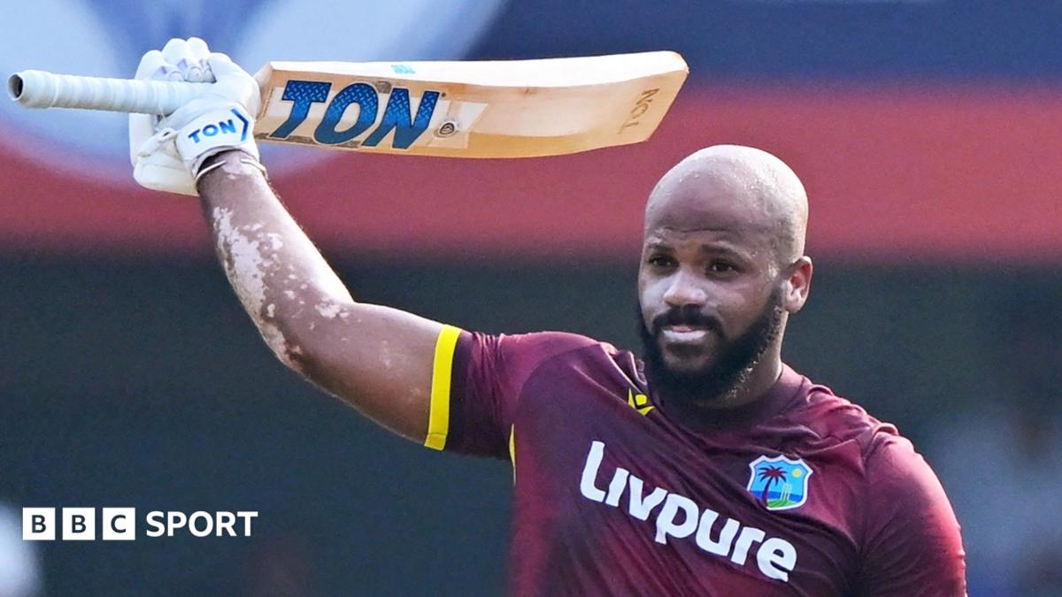 John Campbell raises his bat