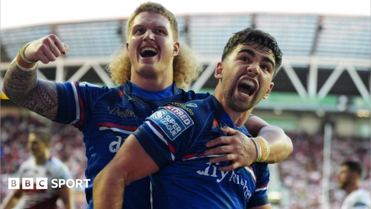 Jack Sinfield celebrates his try for Wakefield