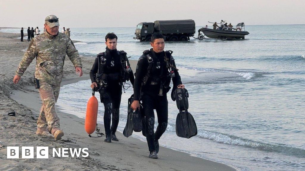 Senior Kazakh officials detained after 14 service members swept out to sea - BBC