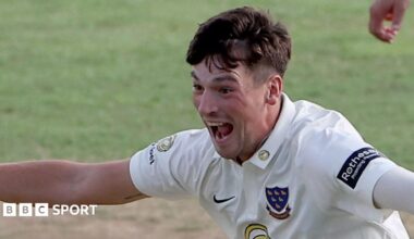 Sussex bowler Henry Crocombe celebrates with his mouth open