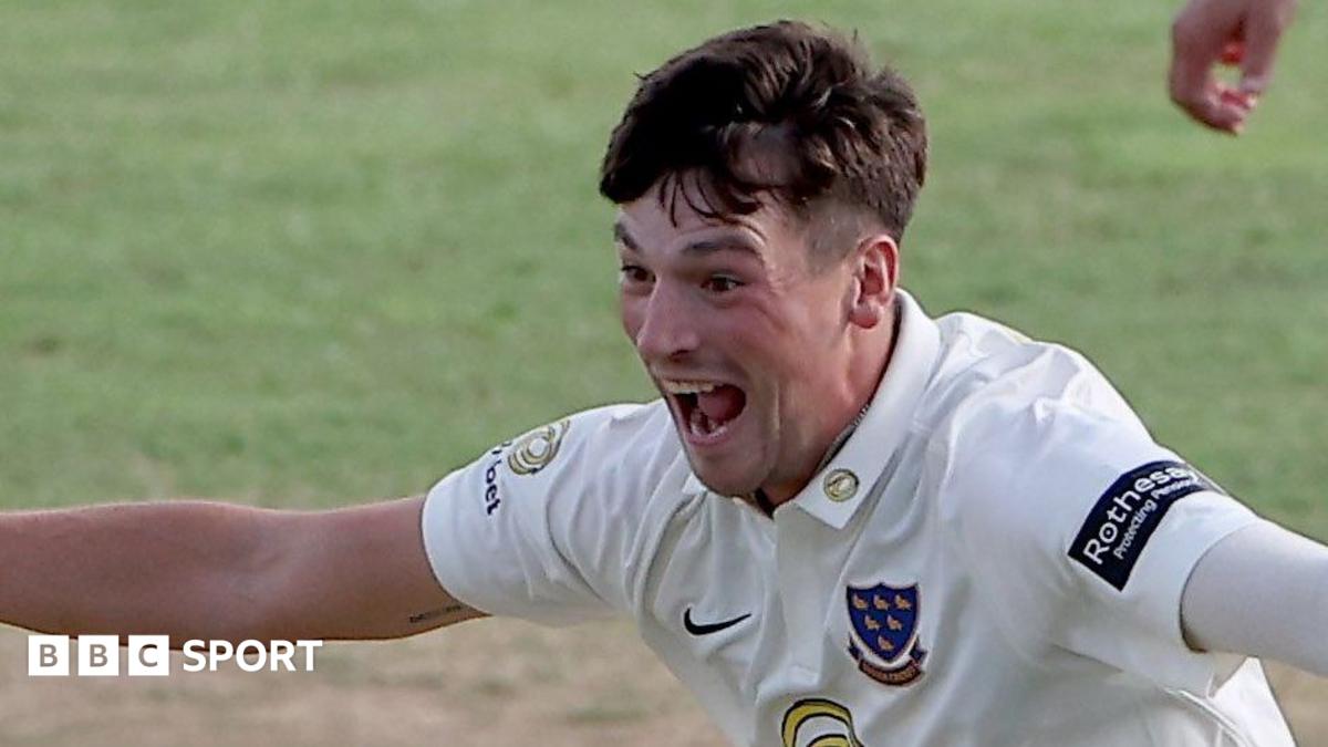 Sussex bowler Henry Crocombe celebrates with his mouth open