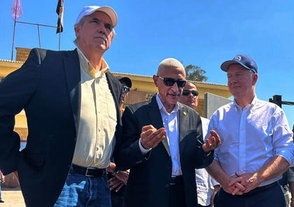 U.S. Senators Jeff Merkley, left, and Chris Van Hollen, right, listen to Major General Khaled Maghawer, governor of North Sinai, during their visit to Egypt's side of the Rafah crossing with Gaza, in 2025. Credit: Mohammed Arafat/AP U.S. Senators Jeff Merkley, left, and Chris Van Hollen, right, listen to Major General Khaled Maghawer, governor of North Sinai, during their visit to Egypt's side of the Rafah crossing with Gaza, in 2025.