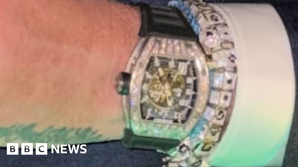 Thieves who stole fashion designer's £137k watch convicted - BBC
