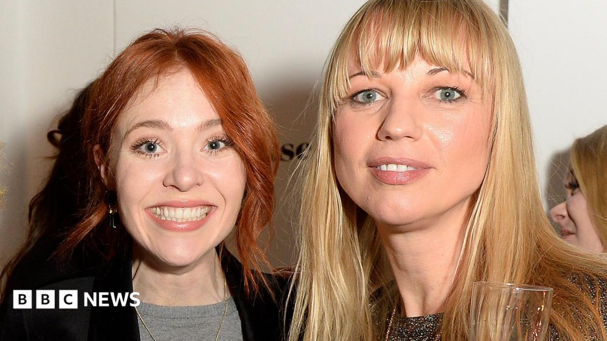 Angela Scanlon grinning alongside Sara Cox, pictured in 2016