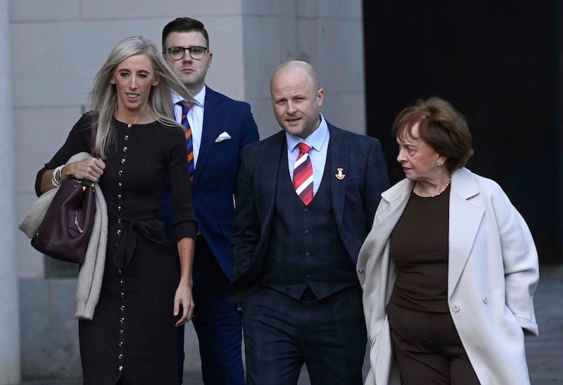 Carla Lockhart of the DUP (left) with Jamie Bryson (centre) and Diane Dodds (right) outside the High Court in Belfast on Saturday. Photograph: Mark Marlow/PA Wire