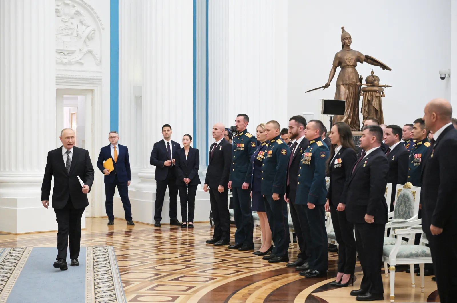 Russian President Vladimir Putin arrives to attend a meeting with participants in the Time of Heroes educational programme for training veterans of the special military operation to become skilled and competent administrators to fill posts in federal and municipal authorities, at the Kremlin in Moscow, Russia.