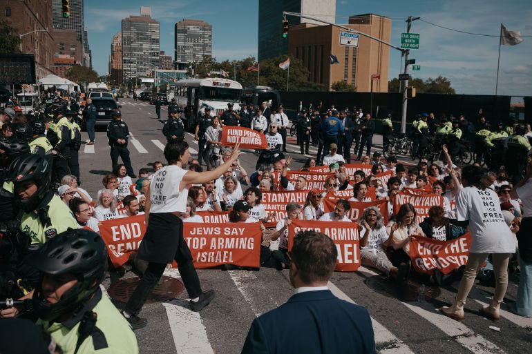 Protesters block a road outside United Nations headquarters during a Jewish Voice for Peace sit-in against Israeli Prime Minister Benjamin Netanyahu on Thursday, Sept. 24, 2026, in New York. (AP Photo/Andres Kudacki)