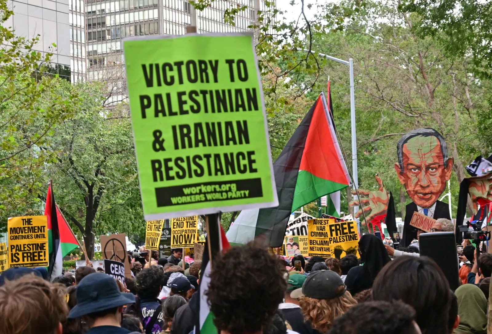Pro-Palestinian protesters gather outside the United Nations on the day that Israeli Prime Minister Netanyahu addresses the General Assembly at the U.N. on September 24 in New York City.