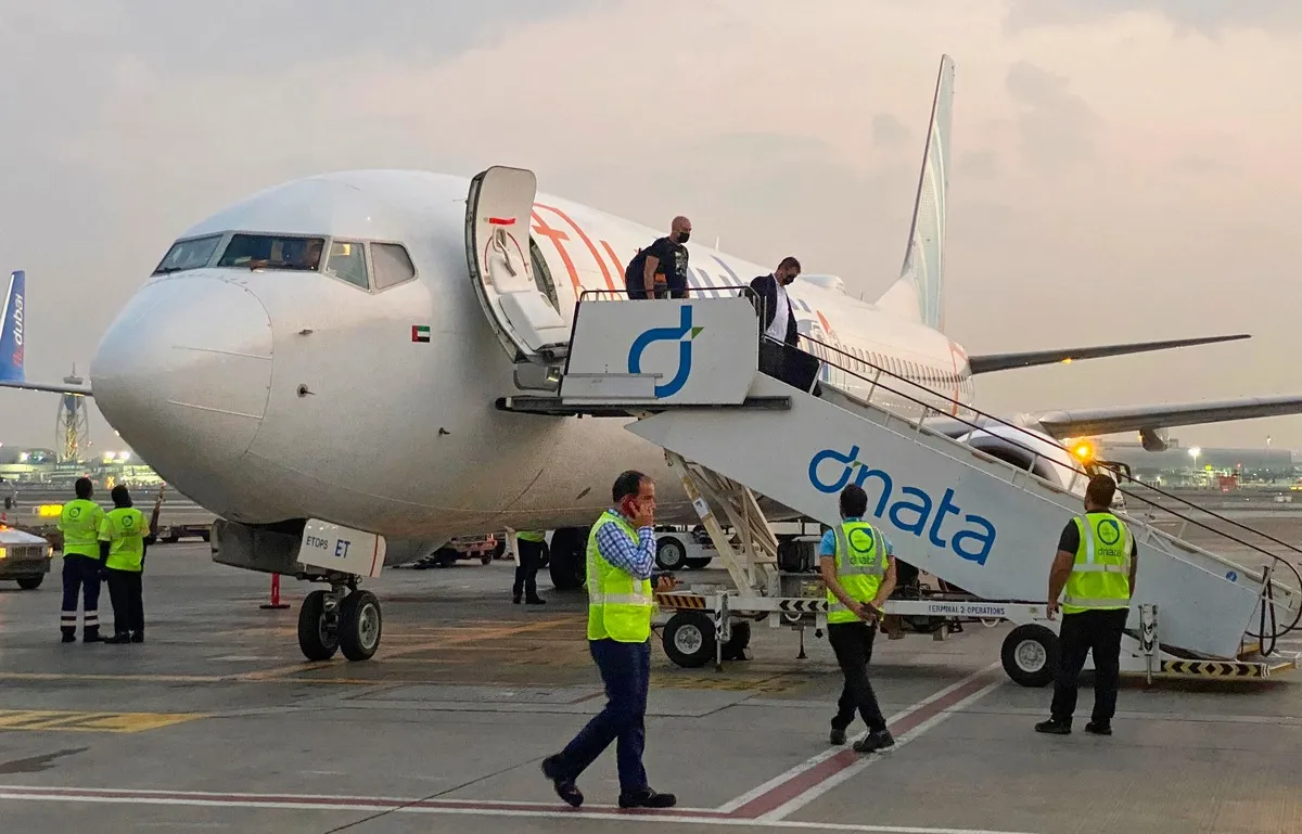 File image: Passengers leave a flydubai plane in Dubai, United Arab Emirates, on November 8, 2020.