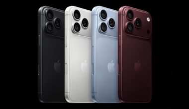Four smartphones in black, white, light blue, and dark red are arranged in a row against a black background, each featuring a triple-lens camera array.