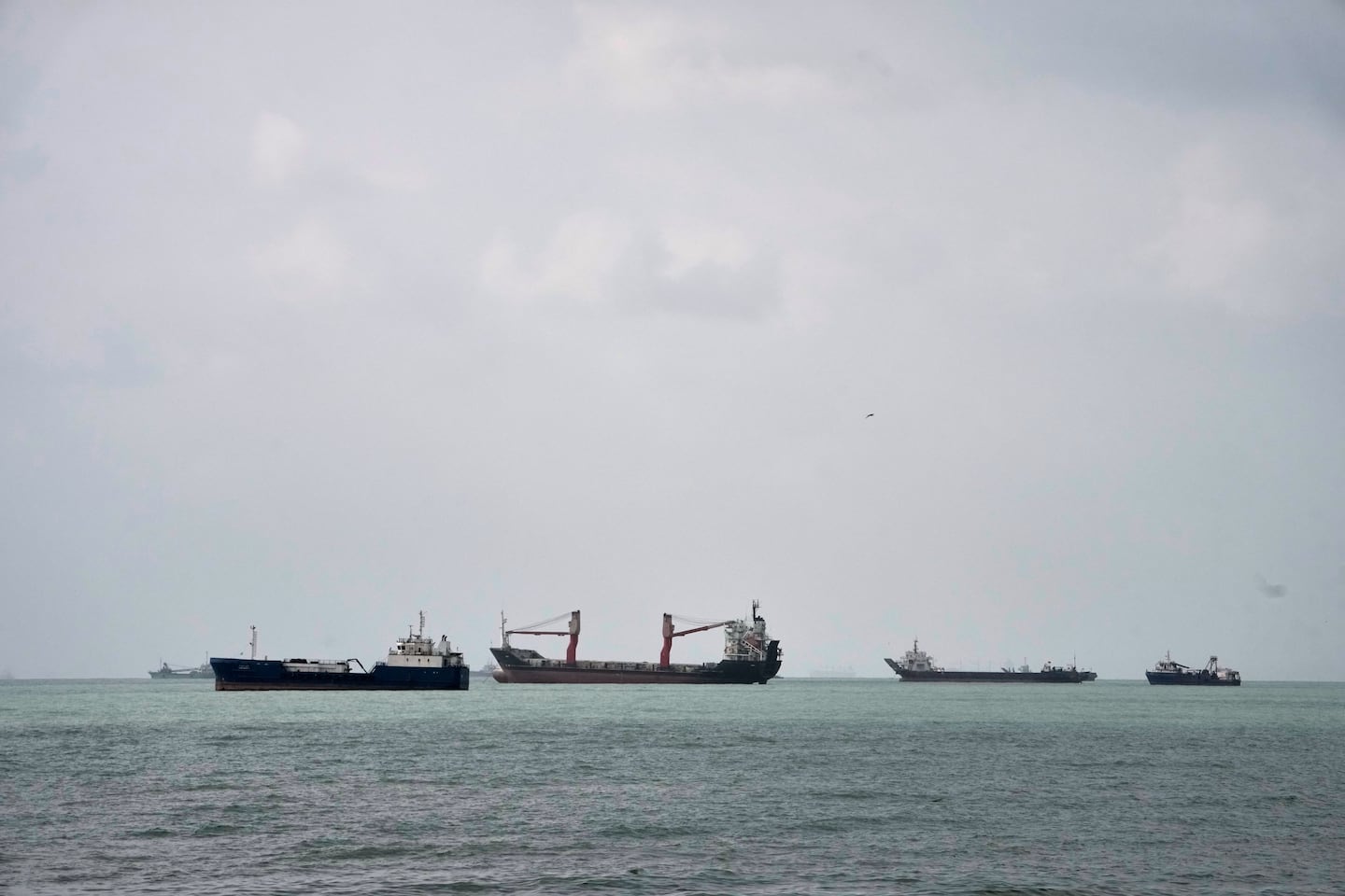 Commercial vessels lie anchored in the Strait of Hormuz off Bandar Abbas, Iran, on Sept. 4, 2026.