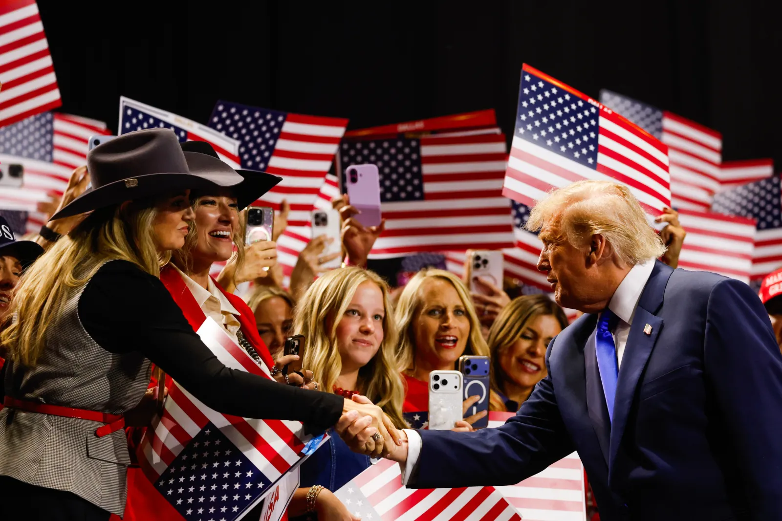 President Donald Trump greets attendees as he walks on stage to speak on the first day of the 2026 Republican National Convention at the American Airlines Center on September 09, 2026 in Dallas, Texas. U.S.