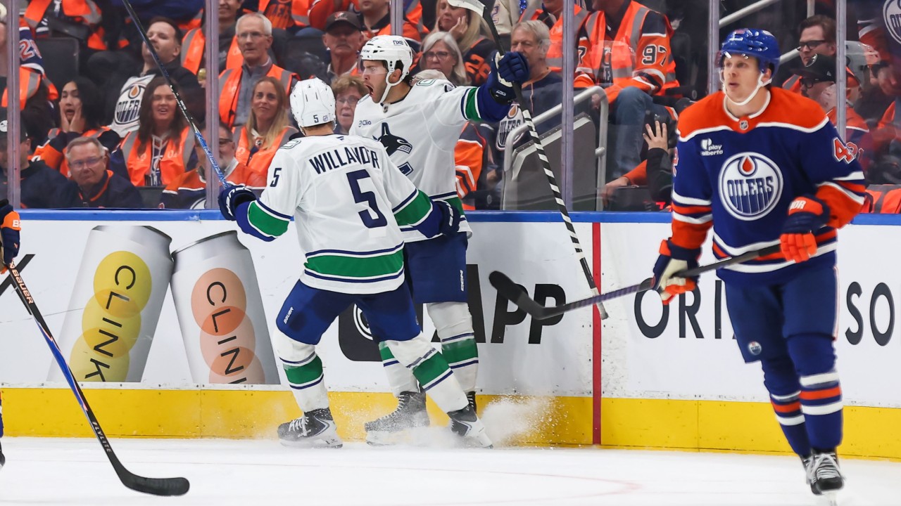 Cotter's eye-opening performance helps rebuilding Canucks stun Oilers
