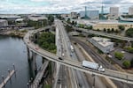 Cars drive on Interstate 5 through the Rose Quarter and on the I-5 southbound ramp to Interstate 84 in Portland, Ore., on Aug. 27, 2026. Parts of the I-5 going southbound, including these two sections, will be temporarily closed starting in September for up to five weeks to repair the aging roadway surface.