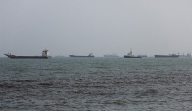 Ships are anchored in the Strait of Hormuz on Aug. 10, 2026 off the coast of Bandar Abbas, Iran. In a recent statement, Iran's Supreme National Security Council said the vital waterway would not reopen until the United States corrects its behavior, demanding that the US end its war on Iran and compensate the country for war damage, among other conditions. Iran has largely halted vessel traffic through the strait with the threat of strikes; meanwhile, the US has imposed a blockade on Iranian ports.