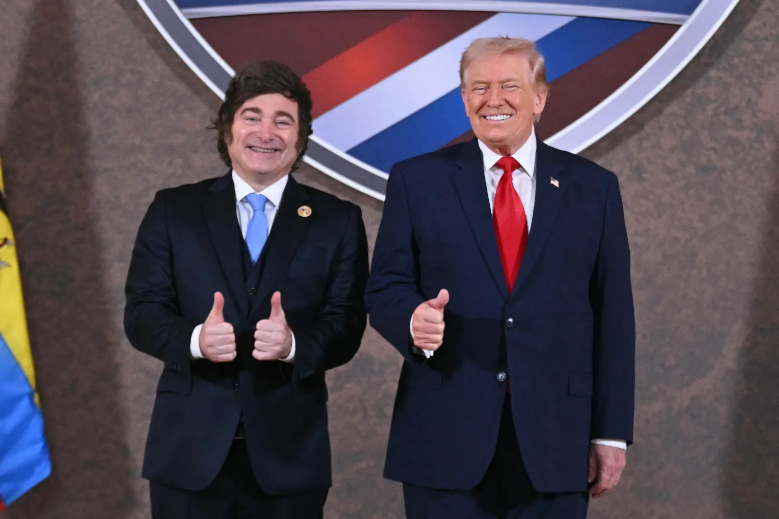 US President Donald Trump and Argentina's President Javier Milei (L) pose for a photo at the beginning of the "Shield of the Americas" Summit at Trump National Doral in Miami, Florida, March 7, 2026.
