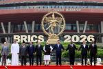 Russia's President Vladimir Putin, India's Prime Minister Narendra Modi, China's President Xi Jinping, South Africa's President Cyril Ramaphosa, Iran's President Masoud Pezeshkian and Ethiopia's Prime Minister Abiy Ahmed pose for a family photo during the 18th BRICS Summit in New Delhi.