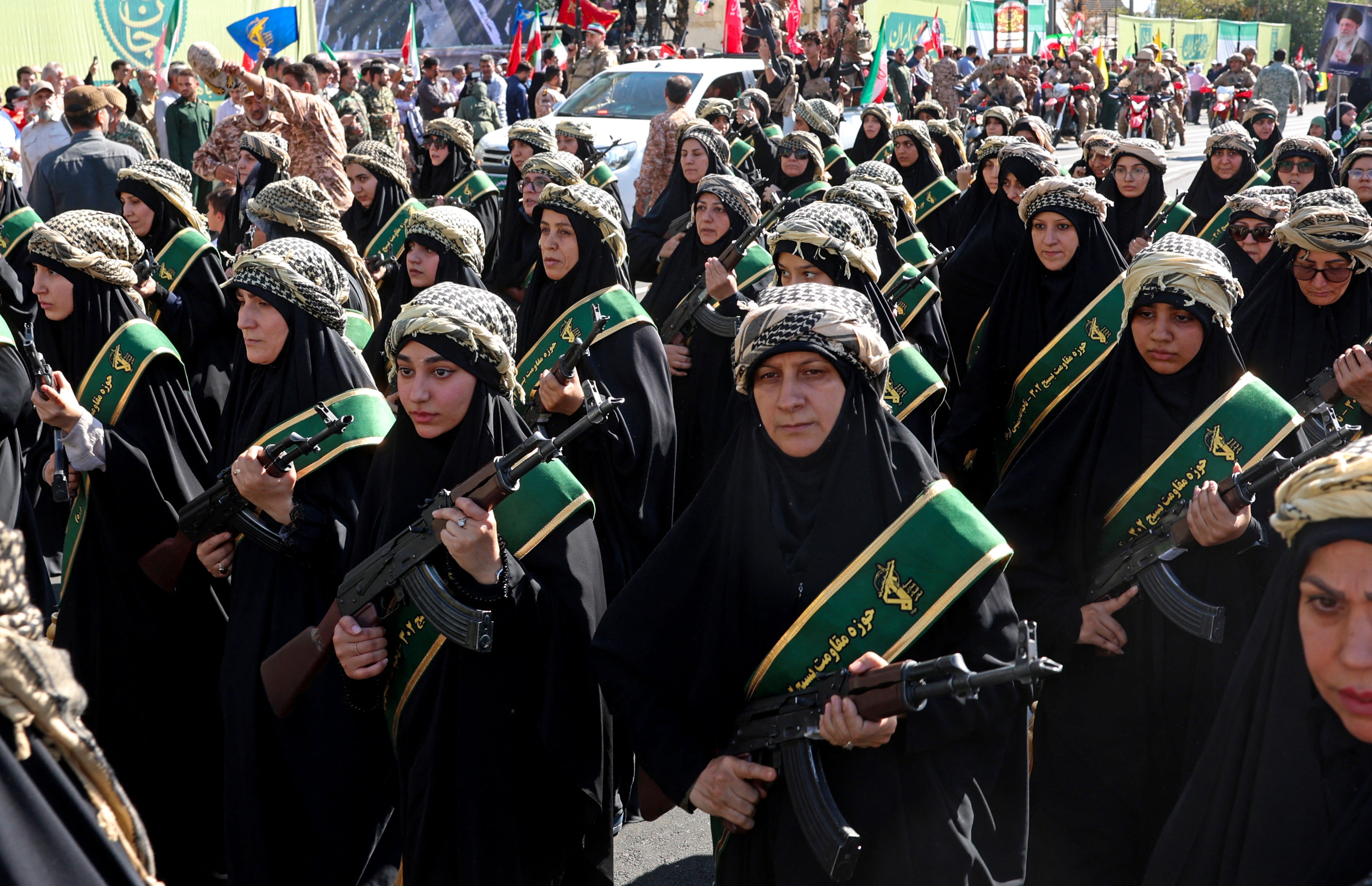 Members of Iran's Basij paramilitary force march with riffles during a military rally named Jan-Fada (those willing to sacrifice their lives) in Tehran September 18, 2026