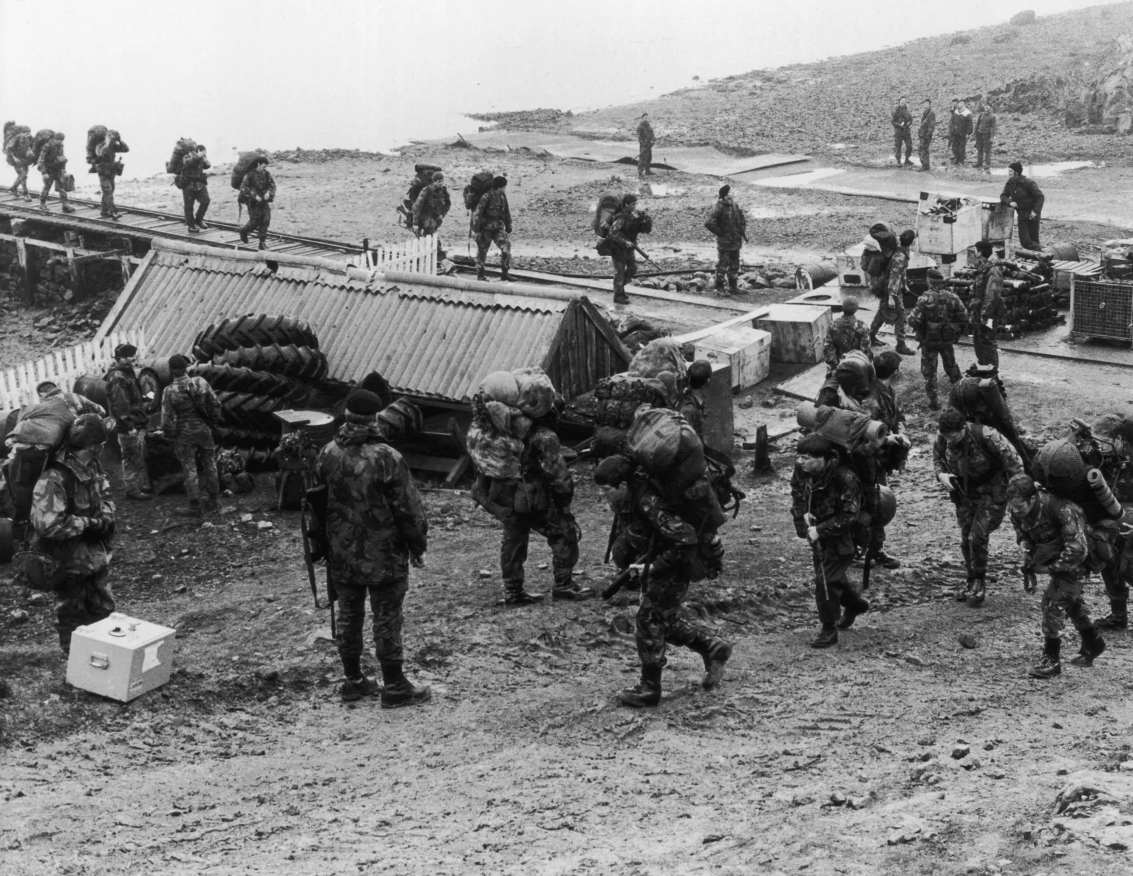 File photo: soldiers move in a British military camp on the Falkland Islands during the conflict, 1982.