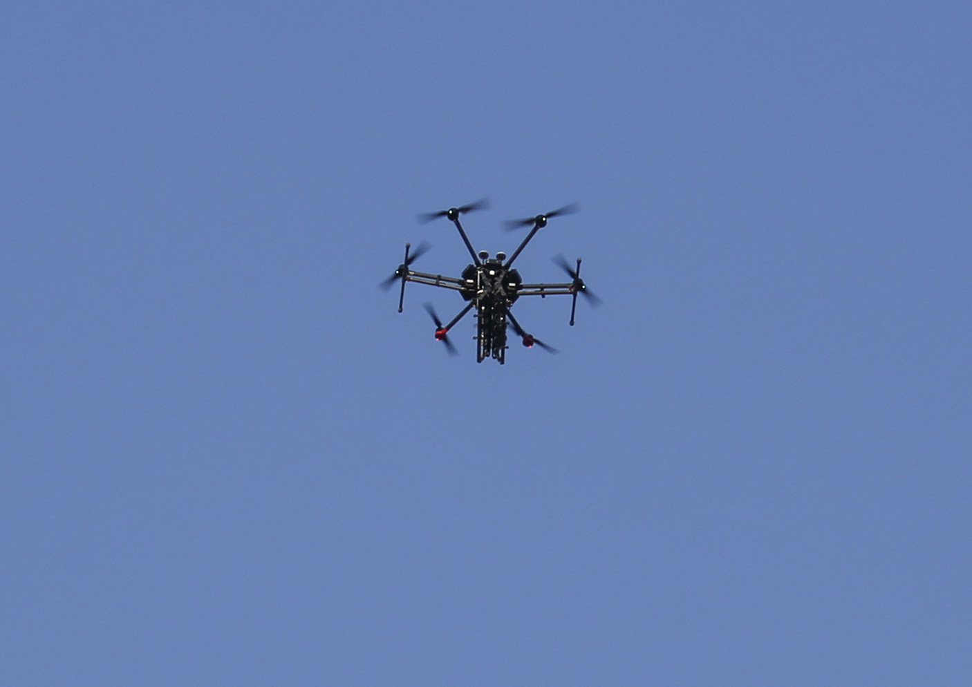 A picture taken on June 5, 2018, shows an Israeli quadcopter drone flying over Palestinian demonstrations near the border with Israel east of Khan Yunis in the southern Gaza.