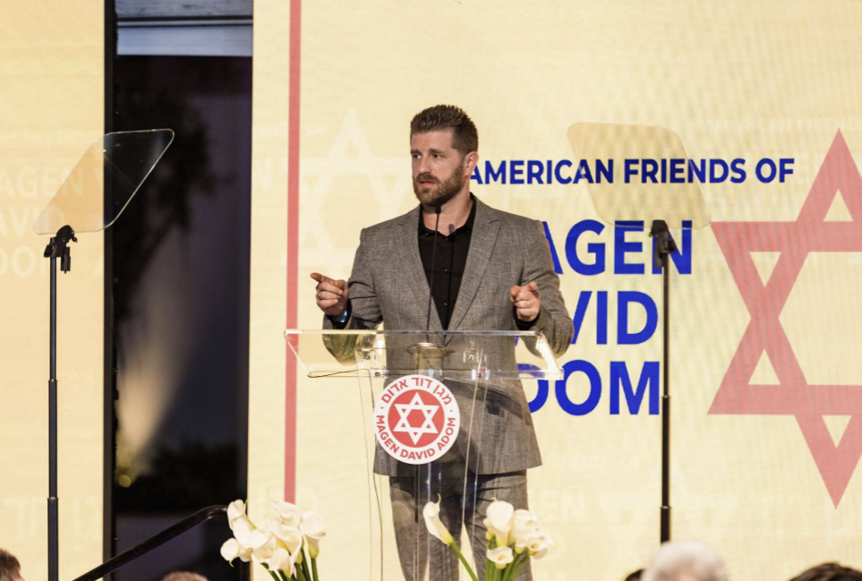 'It's frustrating when people are too afraid to speak their truth because they fear getting canceled, receiving death threats, or facing backlash' (Courtesy of Lynn Abeser) Actor and Advocate Jonah Platt Addressing the Crown in LA