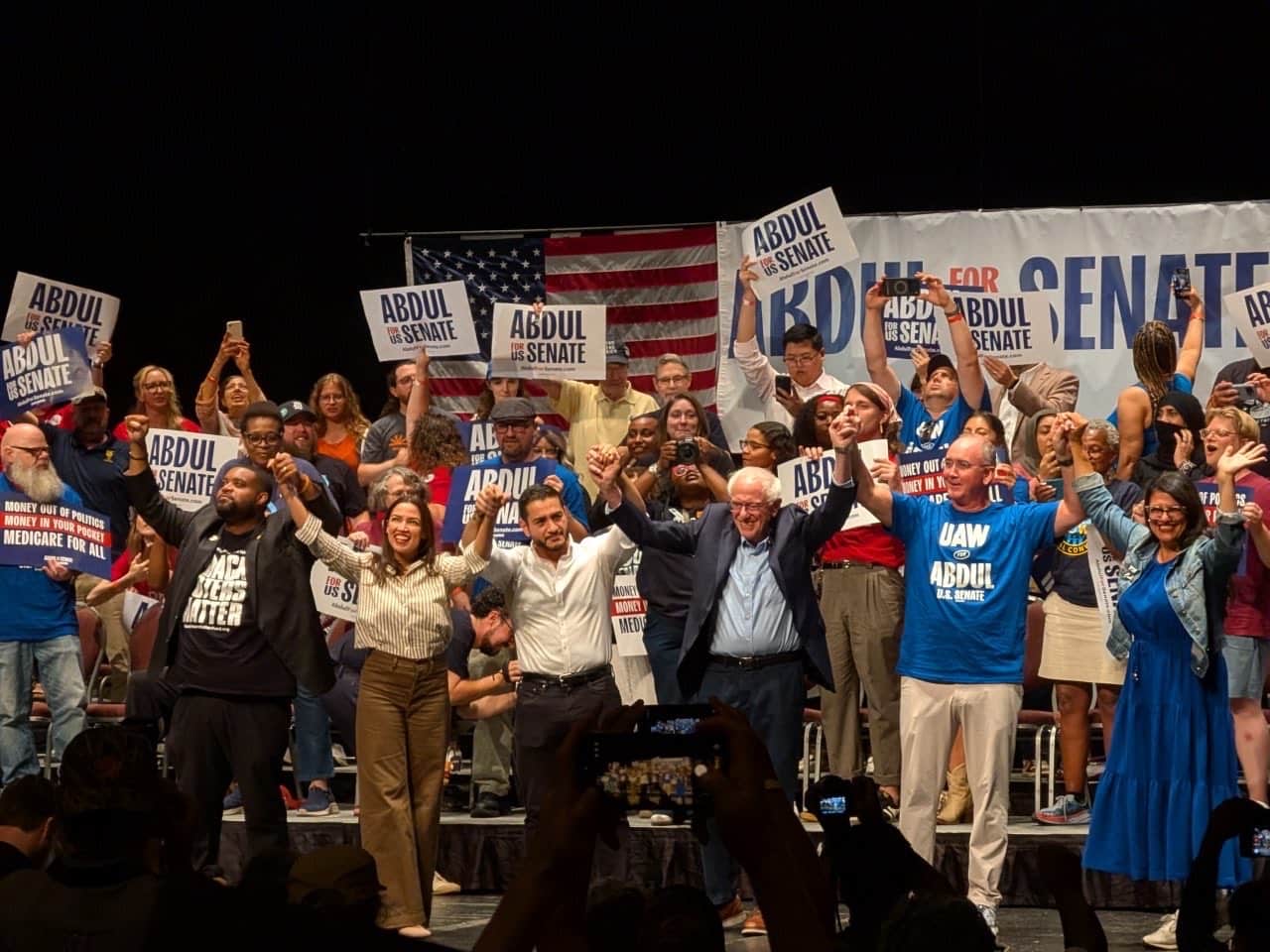 Michigan state Rep. Donavan McKinney (left) and Michigan Democratic Senate candidate Abdul El-Sayed (center) are joined by Rep. Alexandria Ocasio-Cortez, Sen. Bernie Sanders, UAW President Shawn Fain, and Rep. Rashida Tlaib at a rally in Detroit on July 20, 2026. (Photo: x.com/DonavanMI13)