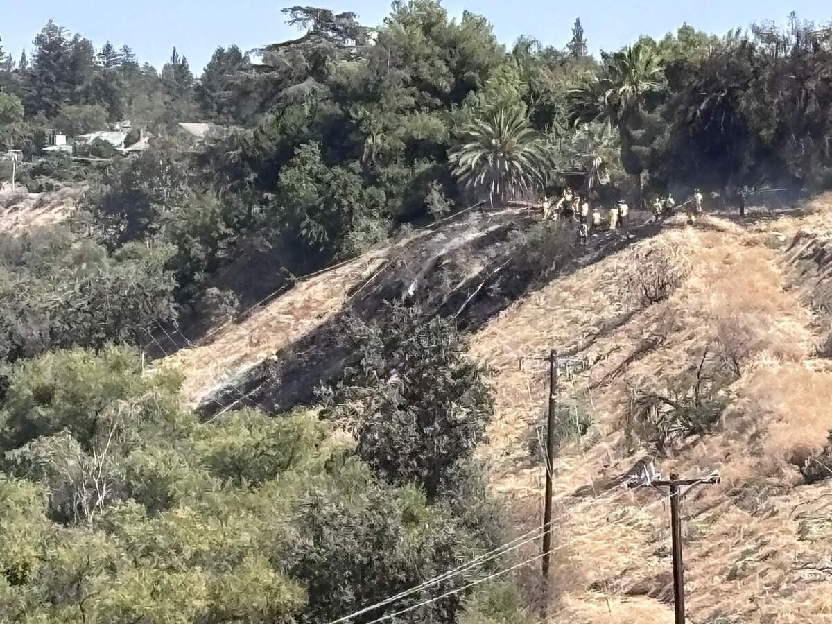 Firefighters extinguished a fire likely caused by a small airplane that crashed.