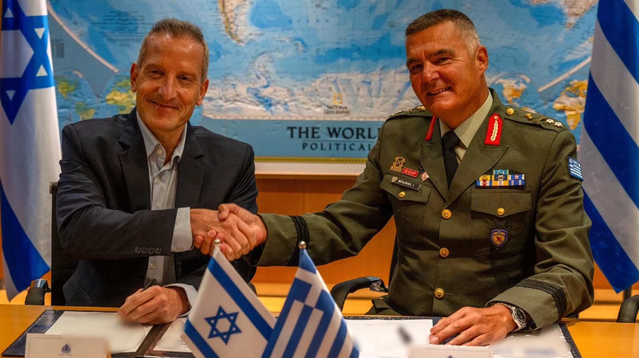 Maj. Gen. Amir Baram, director-general of Israel’s Defense Ministry, and Maj. Gen. Ioannis Bouras of Greece sign major defense export arms deal between their two countries.