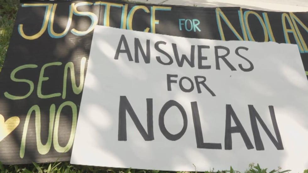 A small group gathered outside the Jackson County Courthouse on July 27, 2026.