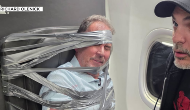 Tucson man arrested on flight fired from real estate job