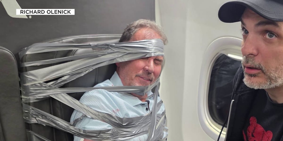 Tucson man arrested on flight fired from real estate job