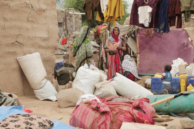Displaced Yemenis prepare their camp in Taiz province, Yemen, Tuesday, Sept. 15, 2026. (AP Photo/Marzouq Al Jabri)