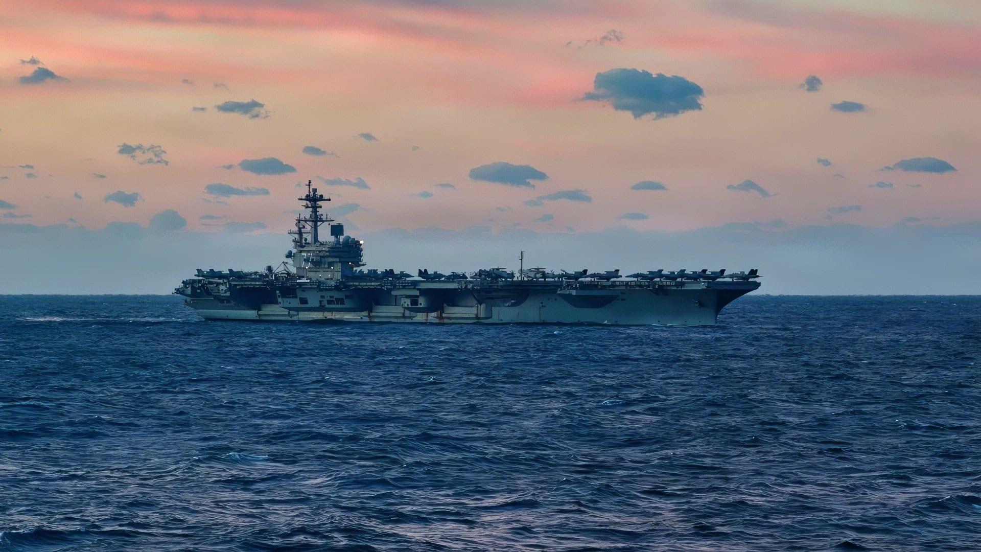 The Nimitz-class aircraft carrier USS George H.W. Bush (CVN 77) sails in the Atlantic Ocean, Feb. 6, 2026. The George H.W. Bush Carrier Strike Group is at sea as an integrated warfighting team. Composite Training Unit Exercise (COMPTUEX) is the Joint Force’s most complex integrated training event and prepares naval task forces for sustained high-end Joint and combined combat. Integrated naval training provides combatant commanders and America’s civilian leaders highly capable forces that deter adversaries, underpin American security and economic prosperity, and reassure Allies and partners. (U.S. Navy photo by Mass Communication Specialist 3rd Class John R. Farren)