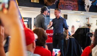 Secretary of Defense Pete Hegseth, left, with Rep. Zach Nunn (R-Iowa), right, at the Iowa State Fair in Des Moines, Iowa, Aug. 17.