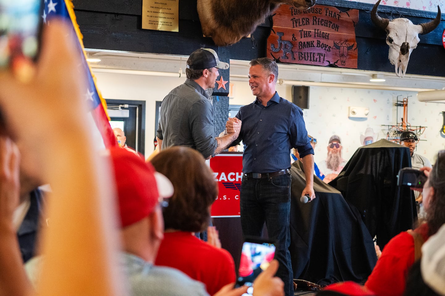 Secretary of Defense Pete Hegseth, left, with Rep. Zach Nunn (R-Iowa), right, at the Iowa State Fair in Des Moines, Iowa, Aug. 17.