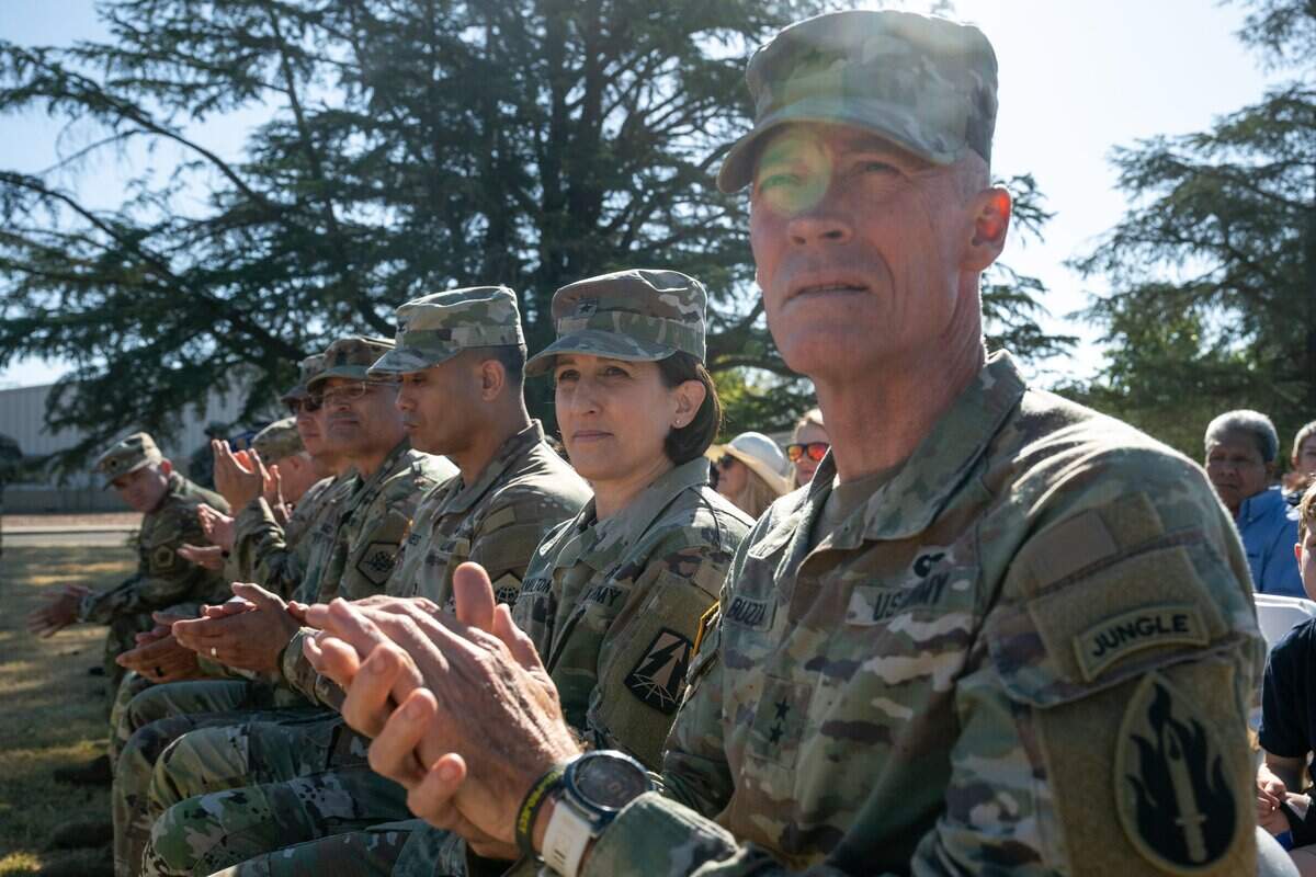 Maj. Gen. Windsor S. Buzza, from right, and Brig. Gen. Kimberly K. Hamilton attend a soldiers’ homecoming and medal ceremony at B.T. Collins U.S. Army Reserve Center in Sacramento on Saturday.